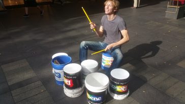 Photo of Gordo Buckets rocking the drums on the streets of Australia.