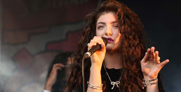 Photography of Lorde singing Royals.